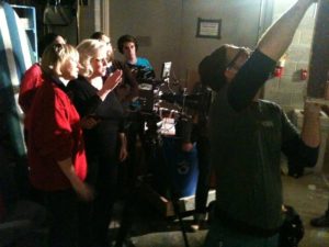 DP Martina Nagel and Director Lauralee Farrer confer on the set in Indiana filming Compline
