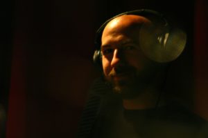 Stephan Hughes running sound on the set of "Compline"